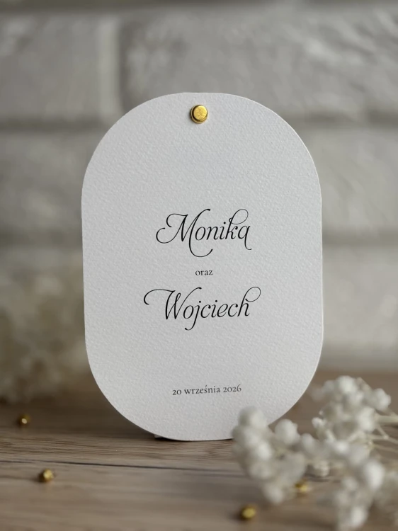 Minimalistyczne owalne zaproszenie ślubne.